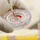 A doctor for tropical medicine prepares a blood sample for analysis during a demonstration for the media of Ebola-treatment capabilities at Station 59 at Charite hospital Aug. 11, 2014, in Berlin. The specialized quarantine unit is among a handful of facilities in Germany that are capable of handling Ebola cases.
Sean Gallup/Getty Images